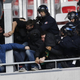 Illustration for article titled Photos: French Soccer Fans Brawl With Riot Police